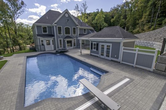 This is a photo of the roman inground swimming pool installed by julianos