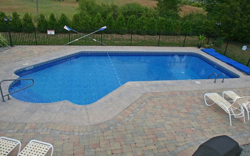 This is a picture of a Custom Lazy L Inground Pool installed by julianos